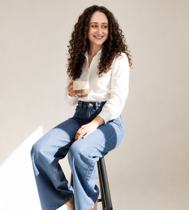 Andrea Diaz, seated, smiling